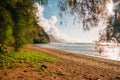 Beautiful shot of the sunset at the beach on the island of Kauai near Na Pali cliffs