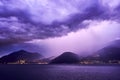 Beautiful shot of a sunset sky over Lake Como and nearby mountains Royalty Free Stock Photo