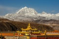 Beautiful shot of the Tagong temple and Yala snowy mountain in Sichuan, China