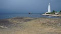 Beautiful shot of the Tarkhankut Lighthouse facing the sea located in Crimea Royalty Free Stock Photo