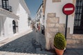 Beautiful shot of traditional houses with white walls on the corner in Ronda Andalusia Spain