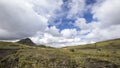 Beautiful shot of a trail on the Landmannalaugar trekking with a house in the background, Iceland Royalty Free Stock Photo