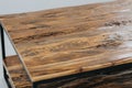 Beautiful shot of an unfinished modern wooden table isolated on a white background