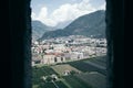 Beautiful shot of the view of buildings and mountains from the Messner Mountain in South Tyrol,Italy