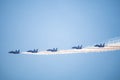 Beautiful shot of the view of five military planes making an airshow in the sky