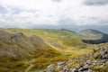 Beautiful shot of the Visocica mountain range under a blue cloudy sky during the daytime Royalty Free Stock Photo