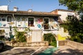 Beautiful shot of a white building in Xativa, Spain covered with colorful doodles