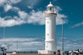 Beautiful shot of a white lighthouse near Kiama blowhole in Australia