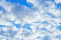 Beautiful shot of white puffy  clouds on a blue sky Royalty Free Stock Photo