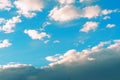 Beautiful shot of white puffy  clouds on a blue sky Royalty Free Stock Photo