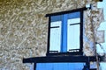 Beautiful shot of a window with wooden shutters of an old building Royalty Free Stock Photo