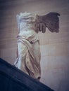 Beautiful shot of the Winged Victory of Samothrace sculpture in the Louvre museum Royalty Free Stock Photo