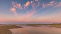 Beautiful shot of wispy clouds adorning the Long Jetty at sunrise, Port Welshpool