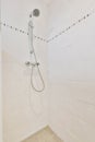 Beautiful shower room with white tiled walls