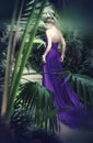 Beautiful, shy girl in long purple dress Royalty Free Stock Photo