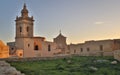 Beautiful Side view on the old, historical St. Joseph`s Chapel inside the Citadel of Victoria surrounded by antique ruins, walls