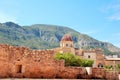 Ancient ruins beside orange trees in Simat de la Valldigna.