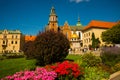 Beautiful sightseeing with Wawel Royal Castle and colorful flowers in Krakow, Poland