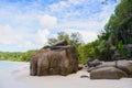 Beautiful silent coastline with big stone and sand