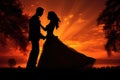 A beautiful silhouette of a bride and groom standing in front of a captivating sunset, Bride and groom silhouettes against a