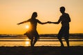 Beautiful silhouettes of dancers at sunset Royalty Free Stock Photo