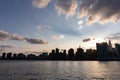 Beautiful Silhouettes of Skyscrapers in the Midtown Manhattan Skyline during a Sunset over the East River in New York City Royalty Free Stock Photo