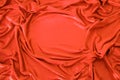 Beautiful silk fabric in red draped with small folds, soft flowing, luxury concept, wedding, copy space Royalty Free Stock Photo