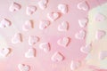 Beautiful silk pink hearts on a pink background. Holiday concept Valentine`s Day. Flat lay. Royalty Free Stock Photo