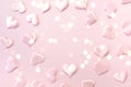 Beautiful silk pink hearts on a pink background. Holiday concept Valentine`s Day. Flat lay. Royalty Free Stock Photo