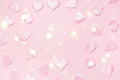 Beautiful silk pink hearts on a pink background. Holiday concept Valentine`s Day. Flat lay. Royalty Free Stock Photo