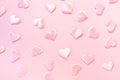 Beautiful silk pink hearts on a pink background. Holiday concept Valentine`s Day. Flat lay. Royalty Free Stock Photo