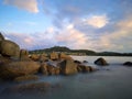 Sunset view with silky smooth water reflection on the sea shore landscape with beautiful sunset view. Royalty Free Stock Photo