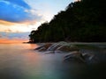 Sunset view with silky smooth water reflection on the sea shore landscape with beautiful sunset view.