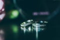 Beautiful silver background with wedding rings Royalty Free Stock Photo