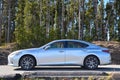 Beautiful silver grey Lexus on the road in the Yellowstone National Park