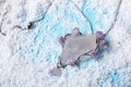 Beautiful silver pendent with pure quartz and amethyst gemstones on snow