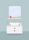 Beautiful sink with cabinet and mirror in the bathroom and cosmetics