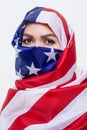 Beautiful Sirian woman wearing a hijab from the American flag Royalty Free Stock Photo