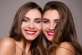 Beautiful sister twins with amazing smile. Royalty Free Stock Photo