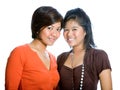 Beautiful sisters in orange and brown top.