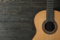 Beautiful six - string classic guitar on wooden background Royalty Free Stock Photo