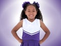 Beautiful Six Year Old Cheerleader Over Purple Royalty Free Stock Photo