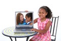 Beautiful Six Year Old Child Showing Off Loved One In Laptop Royalty Free Stock Photo