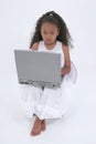 Beautiful Six Year Old Girl With Laptop Over White Royalty Free Stock Photo