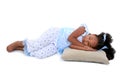 Beautiful Six Year Old Girl Laying Down In Pajamas Over White Royalty Free Stock Photo