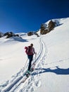 Beautiful ski touring slope in a fantastic mountain world. Ski mountaineering in the swiss alps. Wonderful Skitour.