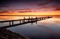 Beautiful skies over Tuggerah Lake with old jetty Royalty Free Stock Photo