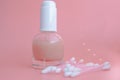 beautiful skin flat lay care pink serum liquid dropper minimal pink background