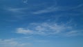 Beautiful sky background with picturesque cirrus clouds. Blue sky called mare s tails indicate fine weather. Timelapse. Royalty Free Stock Photo
