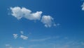 Beautiful sky background with picturesque cirrus and cumulus on different layers clouds. Blue sky called mare s tails Royalty Free Stock Photo